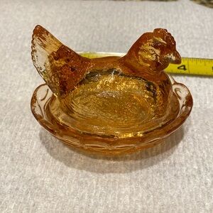 Glass hen on nest